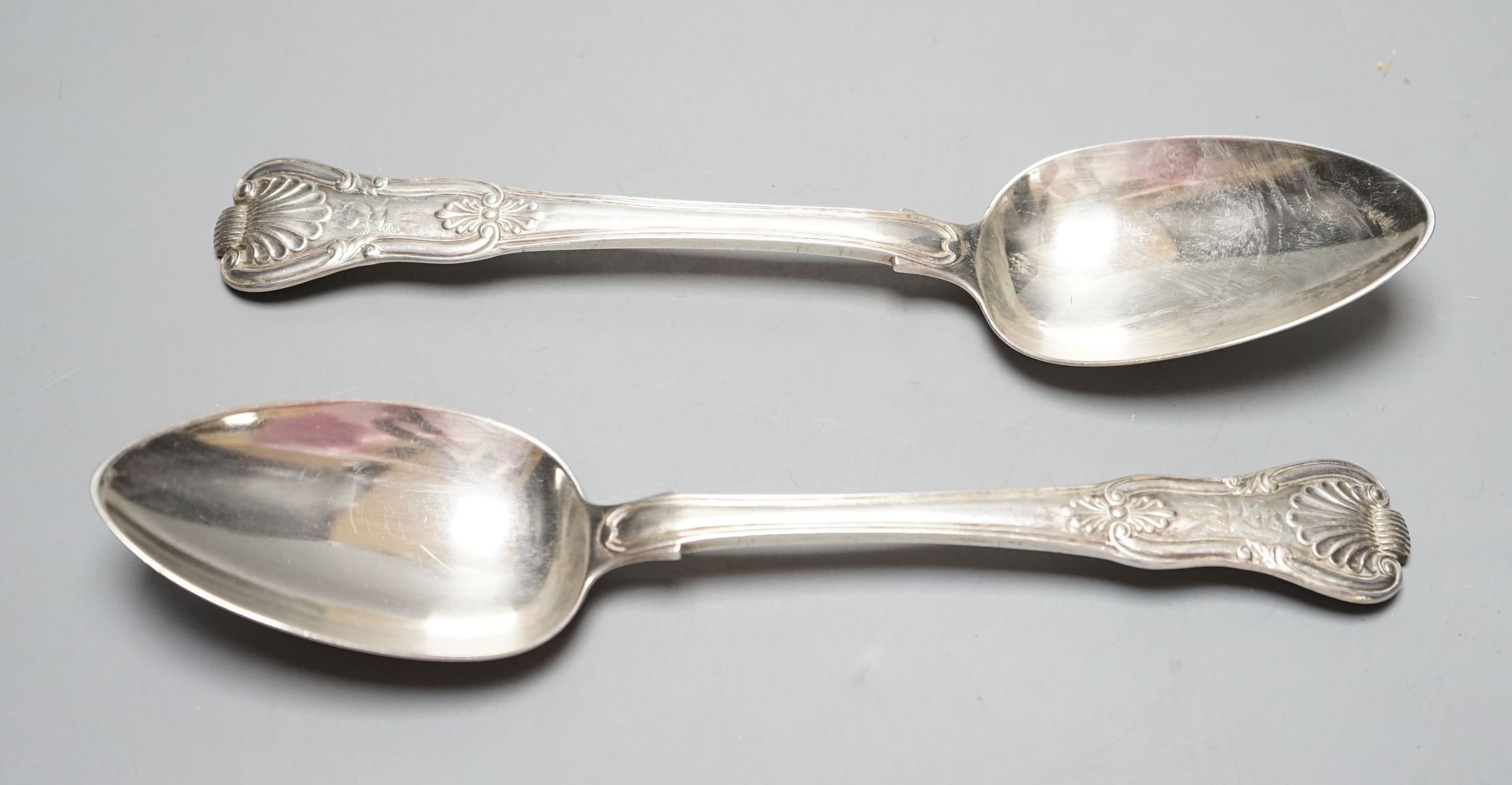 A pair of George IV Irish silver double struck Kings pattern table spoons, by James Scott, Dublin, 1823, 22.3cm, 215 grams.